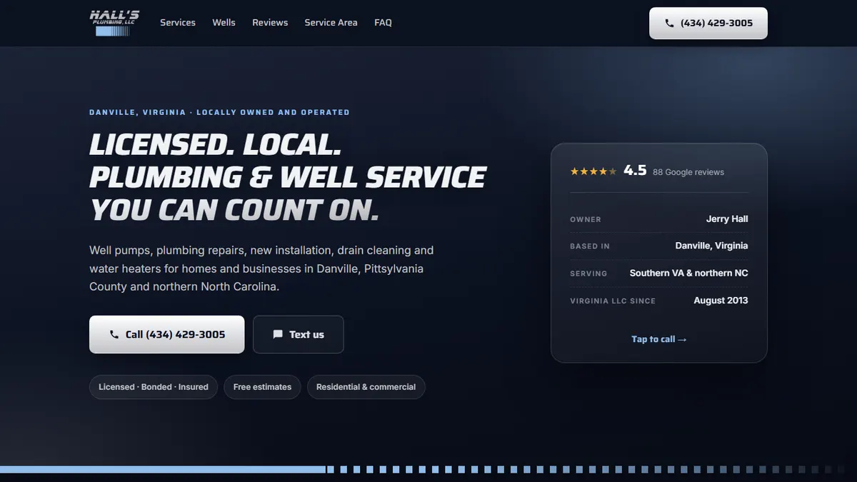 The Hall's Plumbing homepage on a laptop, with the phone number up top